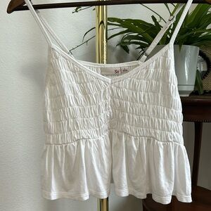 Cropped white flowy tank top with adjustable straps